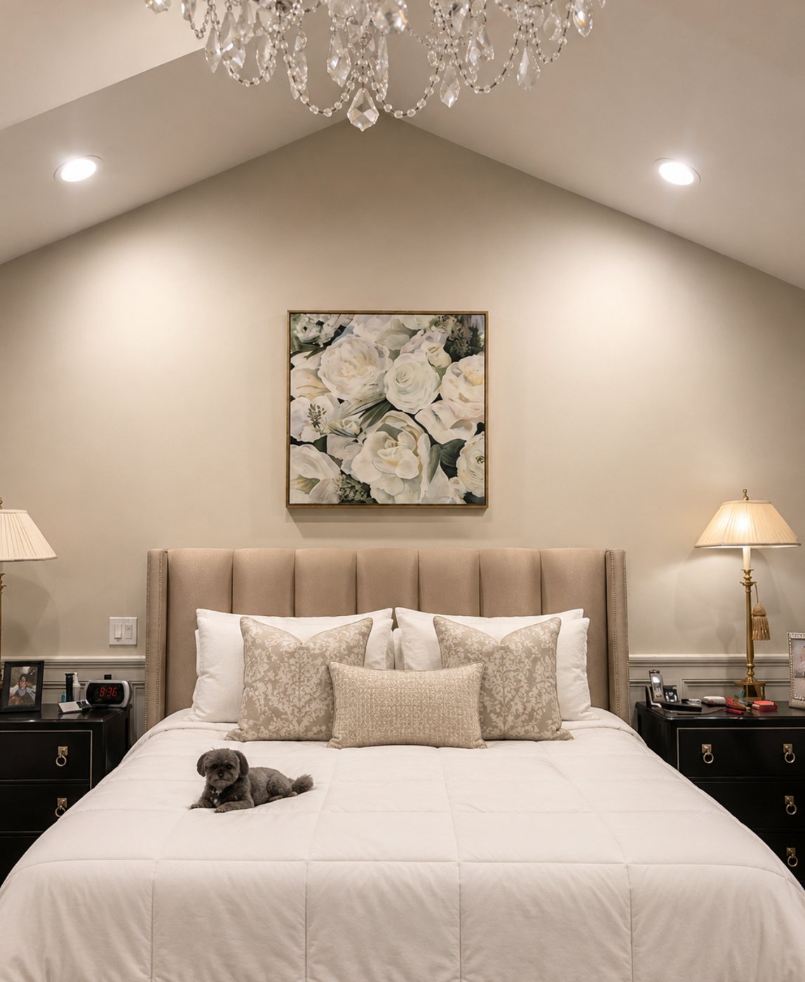 White-rose painting above the bed in a bedroom
